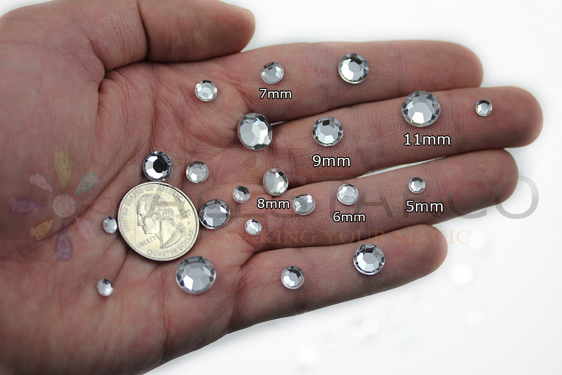 crystal clear acrylic rhinestones size reference on a hand with quarter coin 25 cents