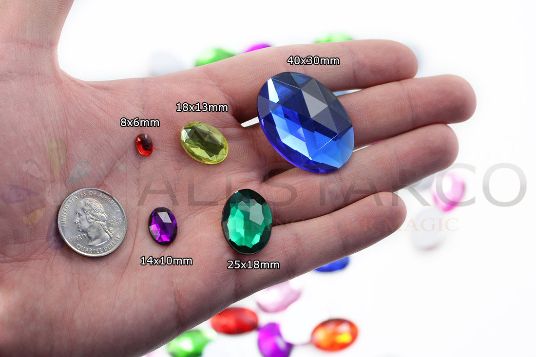 allstarco oval acrylic gems on hand next to 25 cent quarter cosplay gems rhinestones