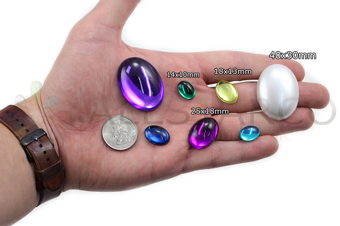 allstarco cabochons pearls acrylic gems on hand next to 25 cent quarter cosplay gems rhinestones